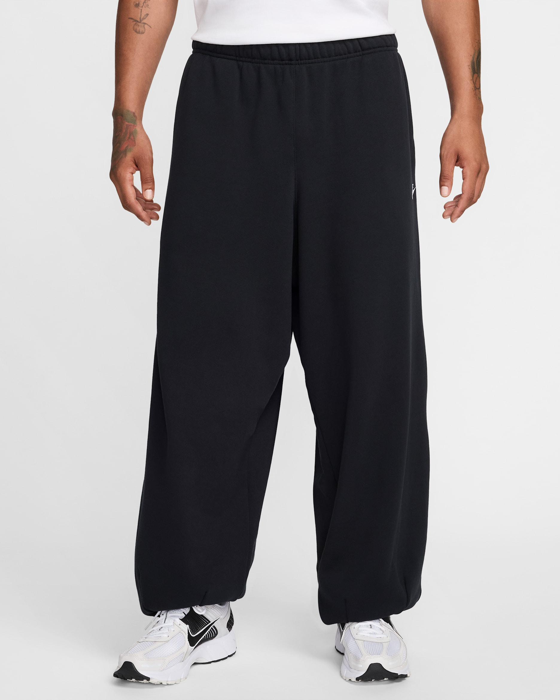Nike Club Fleece Men's Oversized French Terry Trousers. Nike LU